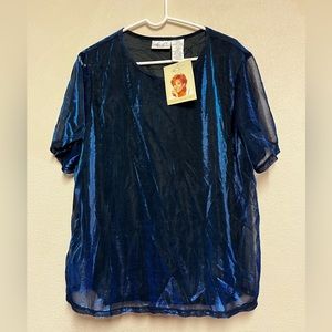 Kathie Lee brand blouse. Flashy blue and black unusual fabric